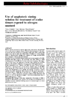 Use of amphoteric rinsing solution for treatment of ocular tissues exposed to nitrogen mustard